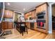 Kitchen with wood cabinets and stainless steel double oven and island at 109 National Way, Carrollton, GA 30116