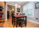 Kitchen with a dining table and chairs, and access to the living room at 109 National Way, Carrollton, GA 30116