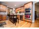 Kitchen with stainless steel oven and appliances with a kitchen island and storage at 109 National Way, Carrollton, GA 30116