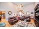 Spacious living room with hardwood floors, high ceilings, and a fireplace, great for entertaining at 109 National Way, Carrollton, GA 30116