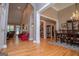 Spacious living room showcasing hardwood floors, an open floor plan and natural light at 109 National Way, Carrollton, GA 30116
