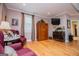 Sitting area with hardwood floors, neutral walls, and comfortable seating at 109 National Way, Carrollton, GA 30116