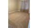 This is a carpeted bedroom with natural lighting at 207 Oak N Cir, Stockbridge, GA 30281
