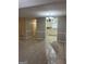 Living room next to the bright kitchen offers ample space at 207 Oak N Cir, Stockbridge, GA 30281