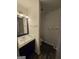 A bathroom featuring a modern vanity with a granite countertop and an adjacent toilet area at 2985 Garnet Way, South Fulton, GA 30349