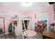 A room with a lofted bed and lots of storage at 107 Meadowbrook Ln, Grantville, GA 30220