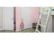 A bedroom with a white door and white walls at 107 Meadowbrook Ln, Grantville, GA 30220