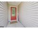 The front door with glass and a welcome mat at 107 Meadowbrook Ln, Grantville, GA 30220