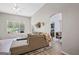 Comfortable living room featuring a gray sectional sofa and seamless transition to the kitchen area at 107 Meadowbrook Ln, Grantville, GA 30220
