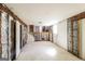 Basement with insulation, concrete walls, and stairs to upper level, waiting for renovation and customization to your taste at 2571 Beech St, Morrow, GA 30260