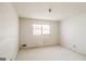An empty bedroom with white walls, a simple window, and ample potential for customization and decor at 2571 Beech St, Morrow, GA 30260