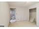 Spacious empty room with white walls, with doorways and a closet, creating a blank canvas for personalization at 2571 Beech St, Morrow, GA 30260