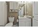 Bathroom with toilet, vanity, mirror and shower at 139 Ardenlee Dr, Peachtree City, GA 30269