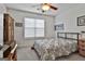 Bedroom with ceiling fan, closet, and window with blinds at 139 Ardenlee Dr, Peachtree City, GA 30269