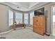 Main bedroom features a bay window and entertainment center at 139 Ardenlee Dr, Peachtree City, GA 30269