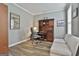 Cozy home office featuring a built-in desk and storage, comfortable seating, and neutral wall colors at 139 Ardenlee Dr, Peachtree City, GA 30269