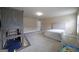 Bedroom featuring neutral carpet, a comfy bed, and a playful playhouse perfect for relaxation and fun at 293 Ironwood Dr, Stockbridge, GA 30281