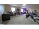 Well-equipped home gym with exercise bike, weights, and modern equipment for a convenient fitness routine at 293 Ironwood Dr, Stockbridge, GA 30281