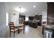 Eat-in kitchen with dark cabinets, a tile floor and stainless steel appliances at 293 Ironwood Dr, Stockbridge, GA 30281