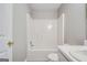 Bathroom features a tub and shower combination with a white sink and toilet at 1643 Jackson Way, Atlanta, GA 30318