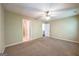 Spacious bedroom with neutral carpet and two entry doors at 1643 Jackson Way, Atlanta, GA 30318