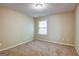 Cozy carpeted bedroom with window offering natural light at 1643 Jackson Way, Atlanta, GA 30318