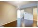 Open dining room with modern lighting and dark hardwood floors at 1643 Jackson Way, Atlanta, GA 30318