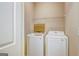 Neat laundry room featuring modern washer and dryer units at 1643 Jackson Way, Atlanta, GA 30318