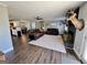 Inviting living room featuring a fireplace, cozy seating, and an open flow to the adjacent kitchen at 3014 Bowdon Tyus Rd, Bowdon, GA 30108