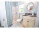 Bathroom featuring a shower, toilet, vanity, and granite countertop at 616 Inman Rd # B, Fayetteville, GA 30215