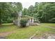 Charming single-story home featuring a brick exterior and a well-maintained lawn at 616 Inman Rd # B, Fayetteville, GA 30215