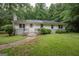 Well-maintained single-story home with landscaped front yard and brick exterior at 616 Inman Rd # B, Fayetteville, GA 30215