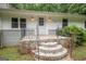 Close-up of home's front entrance with brick steps and wrought iron railings at 616 Inman Rd # B, Fayetteville, GA 30215