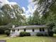 Charming single-story home with a brick foundation and a well-maintained front yard at 616 Inman Rd # B, Fayetteville, GA 30215