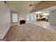 Spacious living room with a vaulted ceiling, fireplace and an open floor plan into the kitchen at 6630 Pole Creek Dr, Lithonia, GA 30058