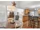Open dining area with wood table and chairs, adjacent to the kitchen and living areas at 4147 Alayna Lee Cir, Mcdonough, GA 30252