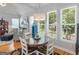 Bright dining area with natural light and views to both living room and kitchen at 4147 Alayna Lee Cir, Mcdonough, GA 30252