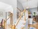 Bright entry foyer leading to the living room with stairs at 4147 Alayna Lee Cir, Mcdonough, GA 30252