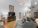 Spacious living room with high ceilings, ample seating, and natural lighting at 4147 Alayna Lee Cir, Mcdonough, GA 30252
