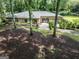Charming brick home featuring manicured landscaping and a welcoming entrance, nestled amongst mature trees at 4187 Cherry Laurel Se Dr, Covington, GA 30014