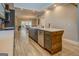 Spacious kitchen with island, stainless steel appliances, and open view to the dining area, perfect for entertaining at 4187 Cherry Laurel Se Dr, Covington, GA 30014