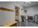 Well-organized laundry room with modern appliances and storage solutions, plus shelving at 4187 Cherry Laurel Se Dr, Covington, GA 30014