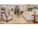 Cozy living room with a fireplace, soft rug, and elegant decor at 4187 Cherry Laurel Se Dr, Covington, GA 30014