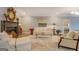 Inviting living room with a fireplace, plush seating, and neutral decor at 4187 Cherry Laurel Se Dr, Covington, GA 30014
