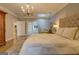 Bright main bedroom featuring a chandelier, skylight, and access to the main bathroom at 4187 Cherry Laurel Se Dr, Covington, GA 30014