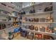 Organized pantry with extensive shelving, providing ample storage for groceries and kitchen essentials at 4187 Cherry Laurel Se Dr, Covington, GA 30014