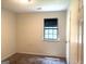 Bedroom with neutral carpet, a closet, and window providing natural light at 7813 Sugarland Dr, Jonesboro, GA 30236