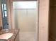 Bathroom closet view with tiled floor and wire shelf at 7813 Sugarland Dr, Jonesboro, GA 30236