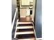View from staircase of updated kitchen at 7813 Sugarland Dr, Jonesboro, GA 30236