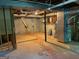 Unfinished basement with visible utilities, and ample room for storage or future renovation at 823 Mountain View Run, Stone Mountain, GA 30087